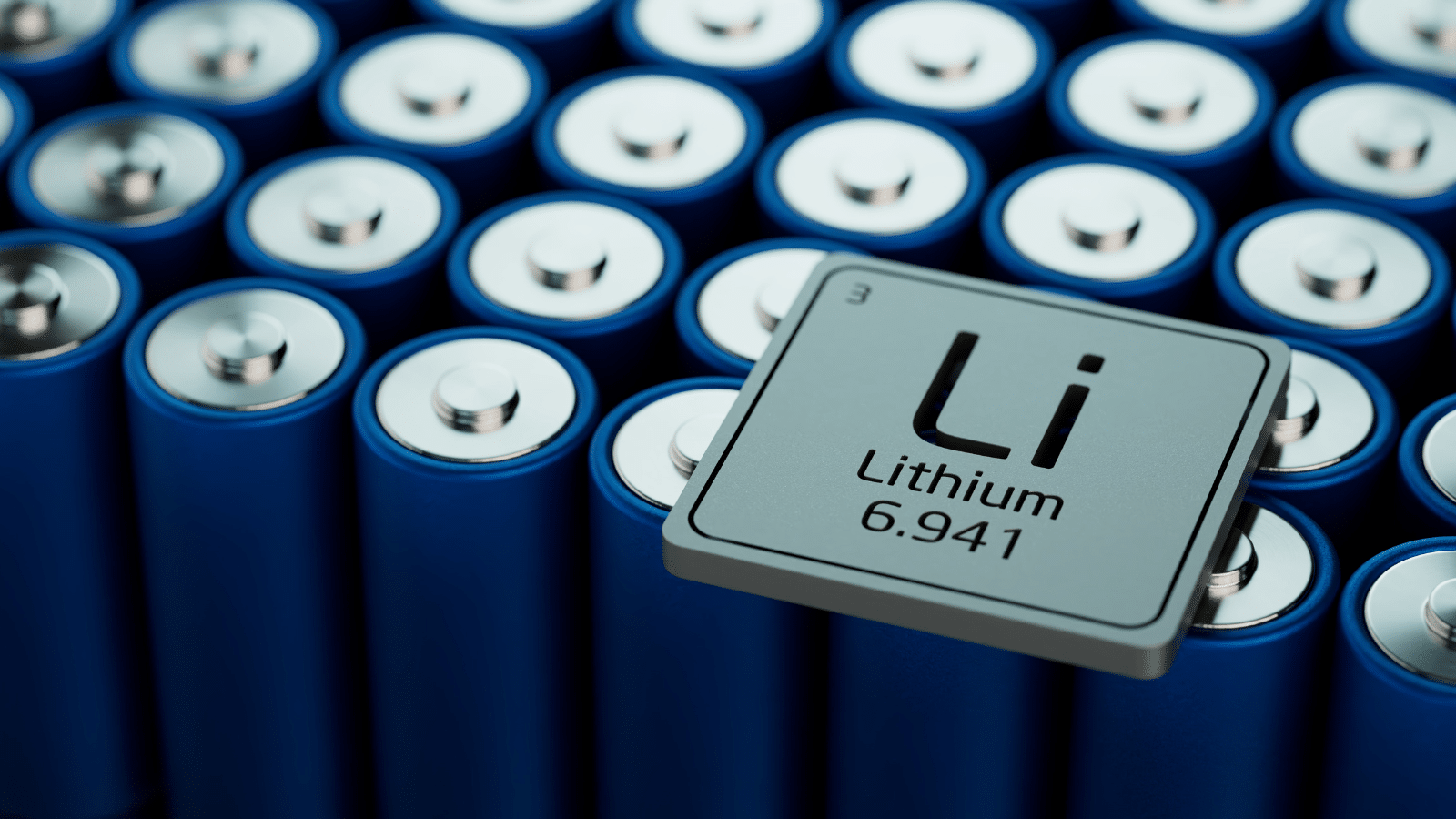 A group of blue cylindrical batteries are arranged closely together, with a lithium element tile displaying Li, Lithium, 6.941 placed on top of them.