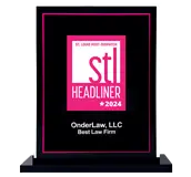 A rectangular black award plaque with a pink and white design reading stl Headliner 2024, honoring OnderLaw, LLC as Best Law Firm.