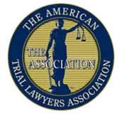 Seal of The American Trial Lawyers Association, featuring the image of Lady Justice holding scales and a sword, surrounded by a dark blue ring with the organizations name in gold letters.