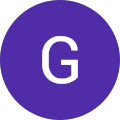 A white, uppercase letter G centered on a solid purple circular background.