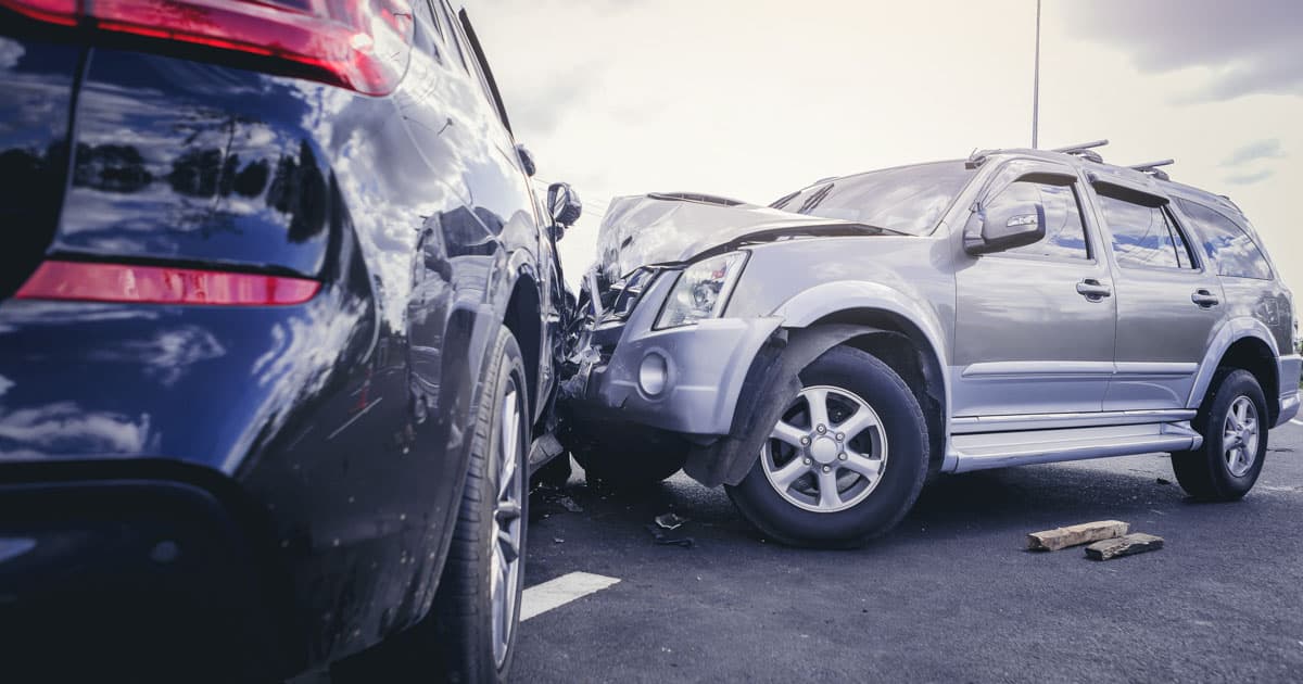 Car crash dangerous accident on the road. SUV car crashing beside another one on the road. onderLaw personal injury AdobeStock 313029390