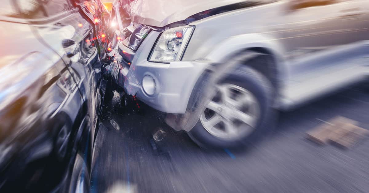 Car crash dangerous accident on the road. With speed zoom blur. onderLaw personal injury AdobeStock 313196725