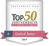 A badge reading Top 50 Jury Verdicts All Practice Areas, United States, 2017 from topverdict.com, with a pink and blue ribbon at the bottom.